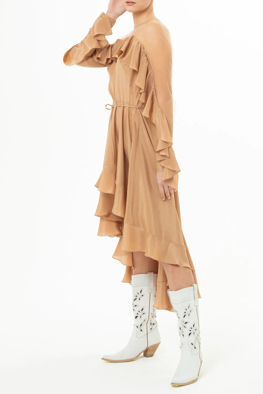 Dress with a frill and an asymmetrical hem line